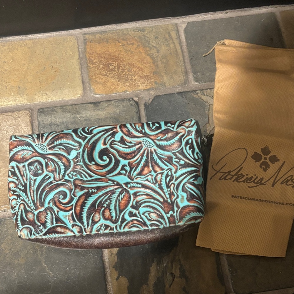 Patricia Nash tooled turquoise Wristlet with bag
NWOT